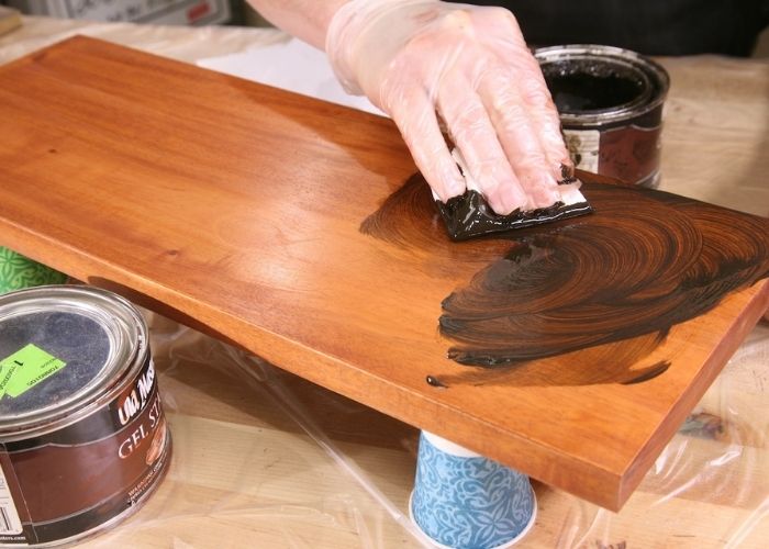 can you stain over painted wood