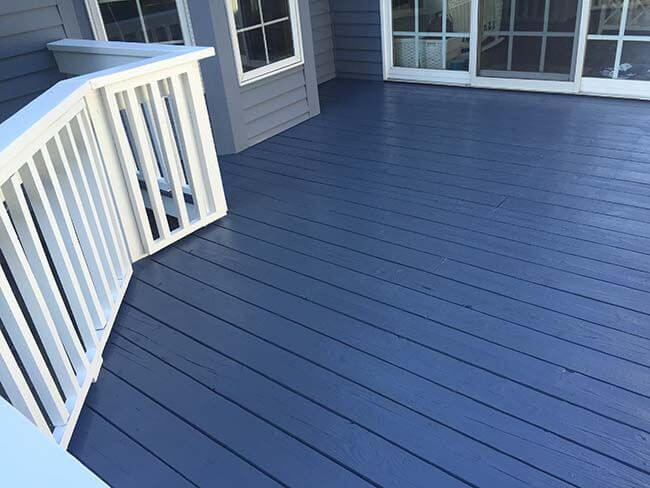 Blue deck paint colors for a white house image