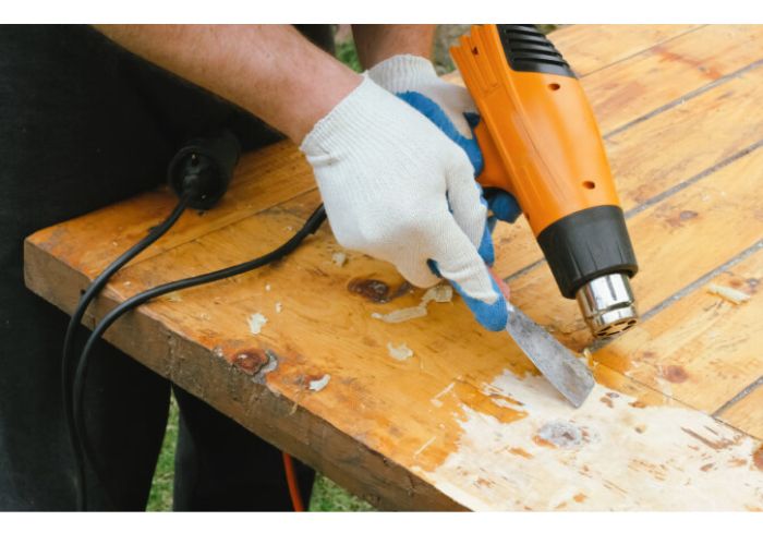 Removing Dry Acrylic Paint From Wood Deck Using a Heat Gun