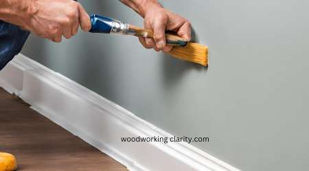 applying paints on trims and baseboards